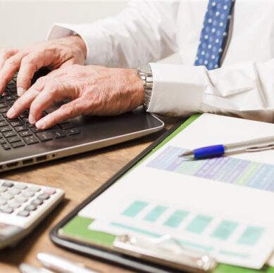 businessman writing laptop